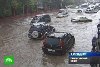 Фото: кадр телеканала НТВ | «Никакой жары не будет». Рекордно сильный ливень обрушится на Владивосток